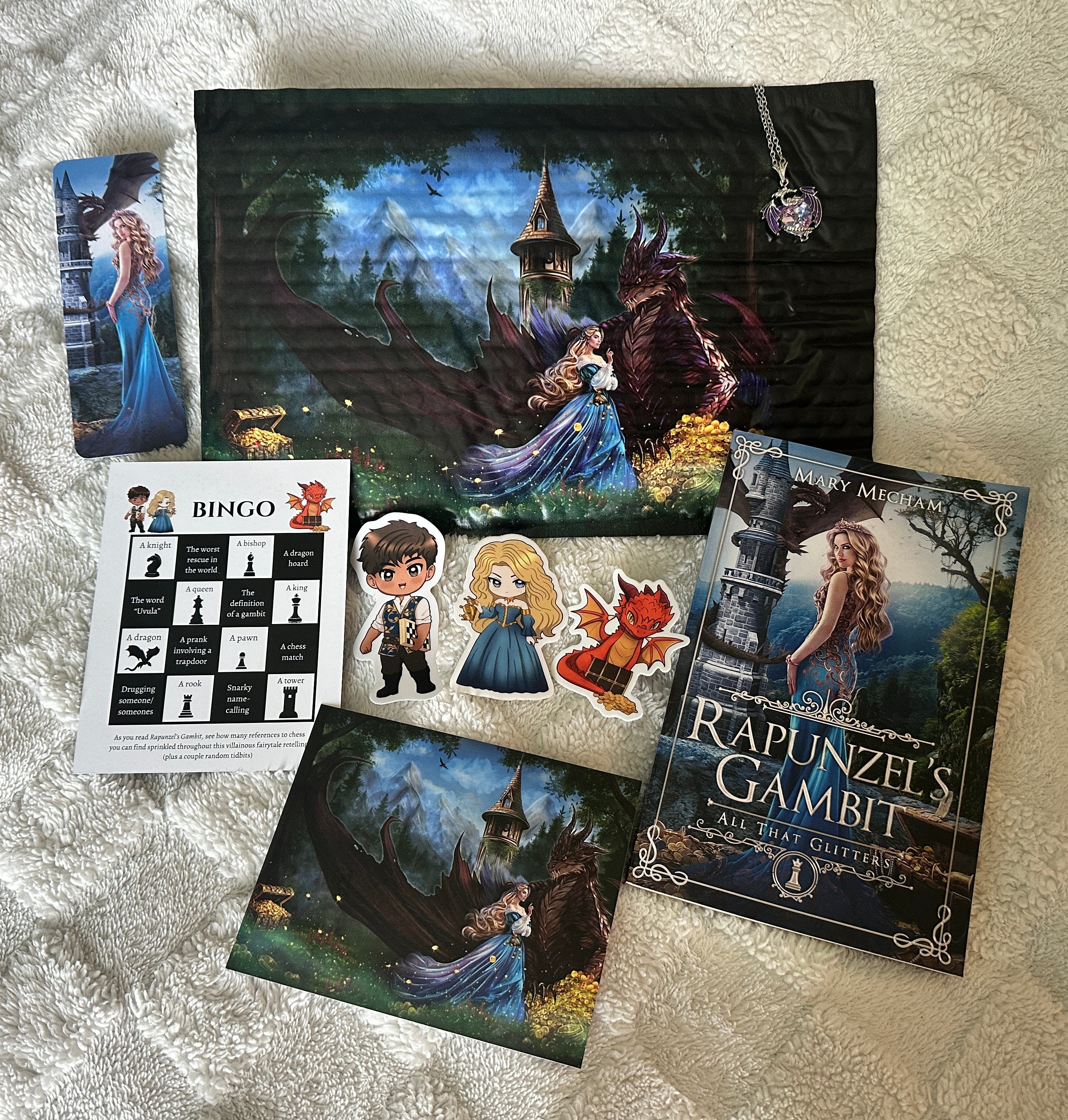 RAPUNZEL SIGNED PAPERBACK AND SWAG