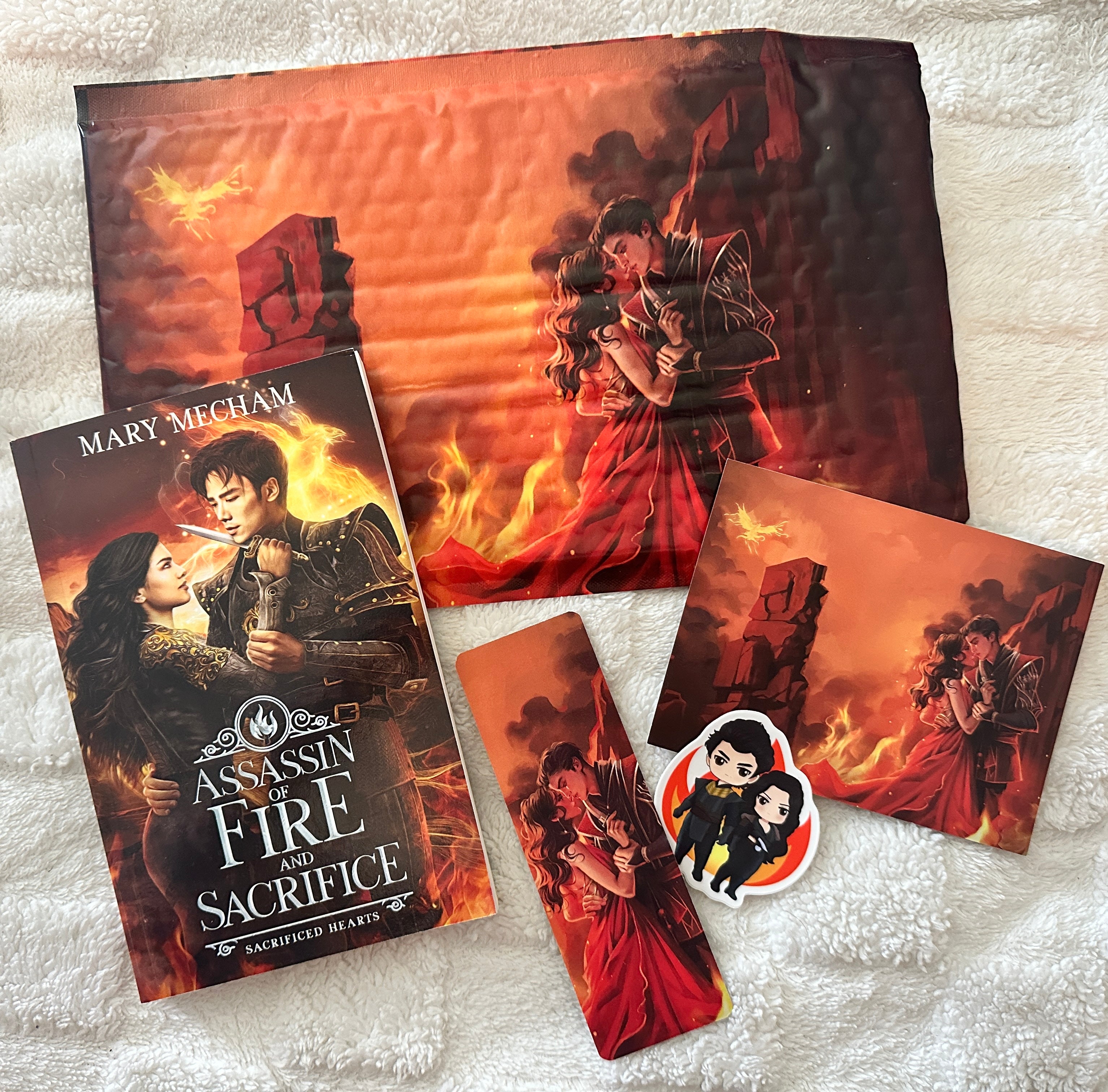 ASSASSIN OF FIRE SIGNED BOOK AND SWAG