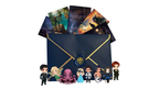 Collection of figurines and illustrated cards in front of a large envelope on a white background